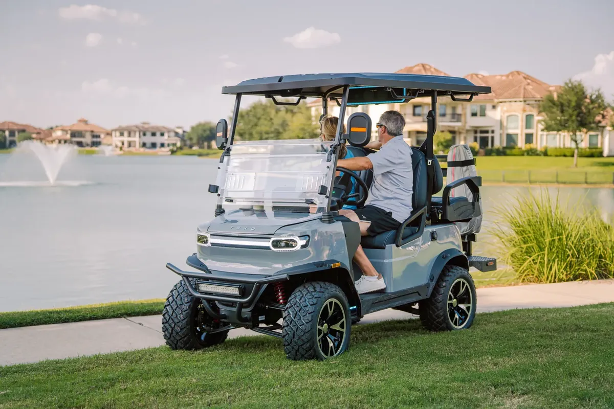 Golf cart parked lakeside in a Lowcountry community